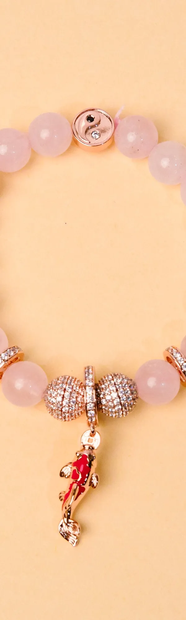 Hồng Ngự — Vòng Thạch Anh Hồng Charm Cá Koi Cát Tường